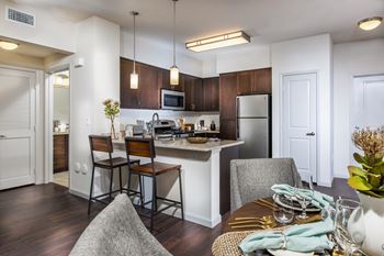 Furnished kitchen with stainless steel appliances